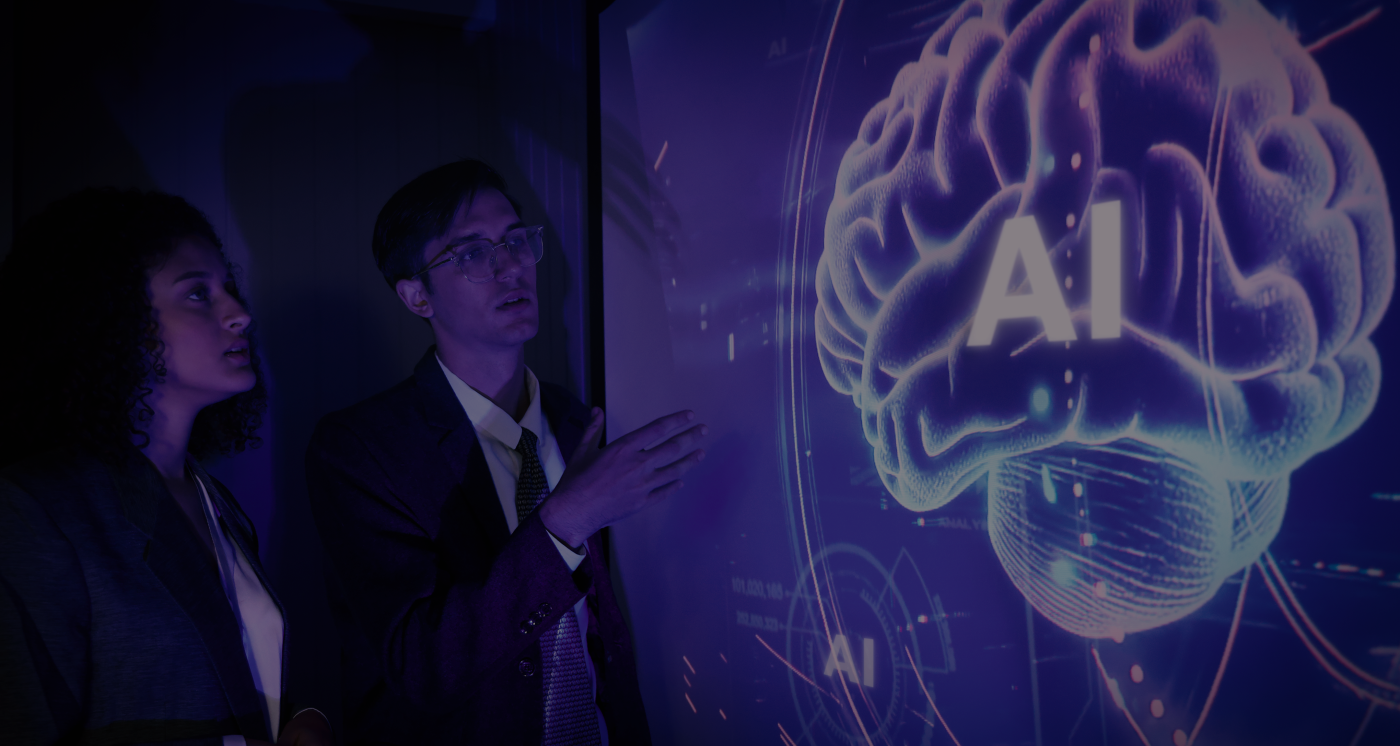 Two strategists looking at a high-tech screen with AI integration